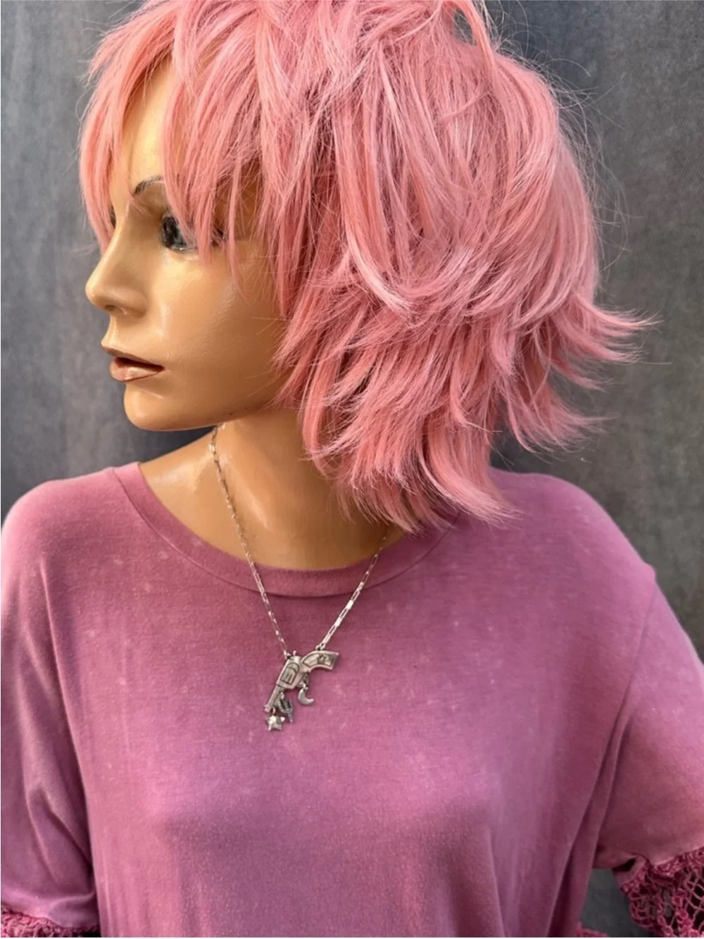 Silver revolver necklace